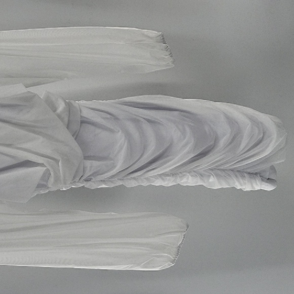 Elegant White Dress With Semi Transparent Sleeves - Picture 11 of 16